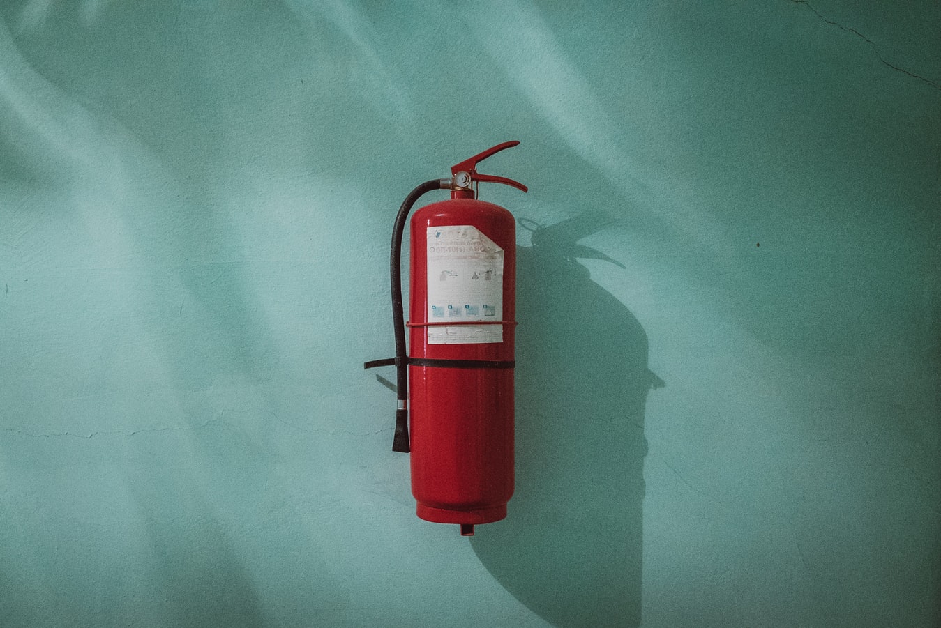 How can I check if my fire extinguisher service provider is certified?